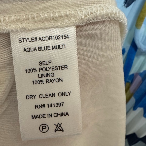 Aquata Dress in Aqua Blue Multi
ASTR the Label/ Revolve Size Medium - Picture 9 of 9